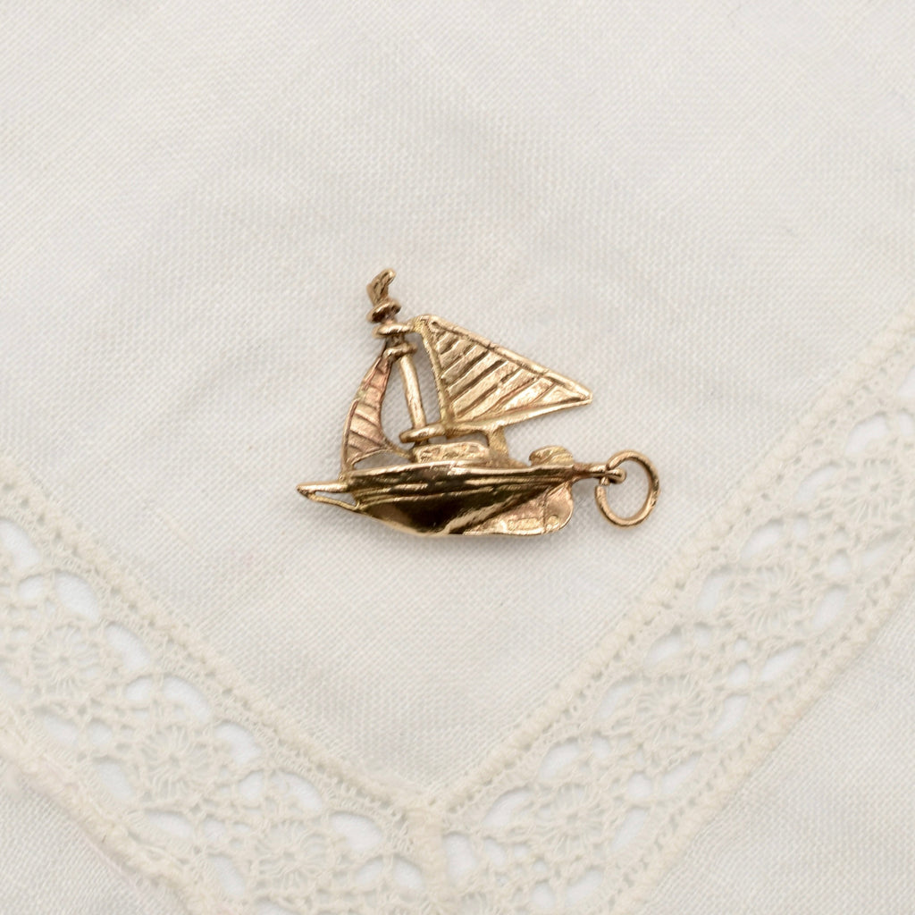 9K Gold Sailboat Charm with Moving Sail - UK Hallmarks