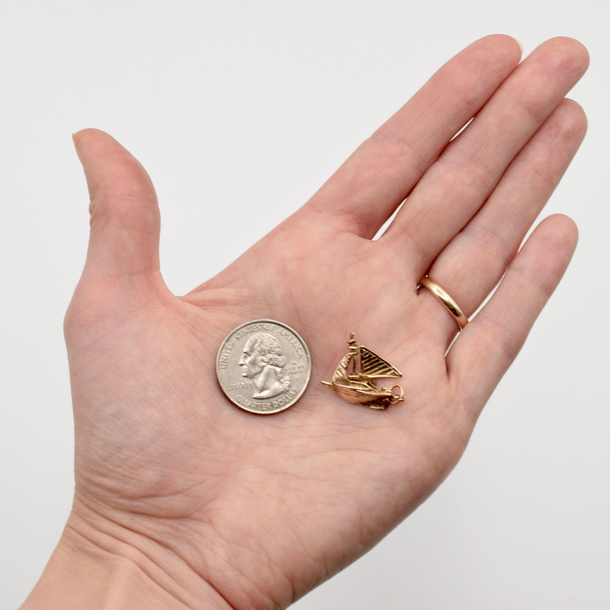 9K Gold Sailboat Charm with Moving Sail - UK Hallmarks