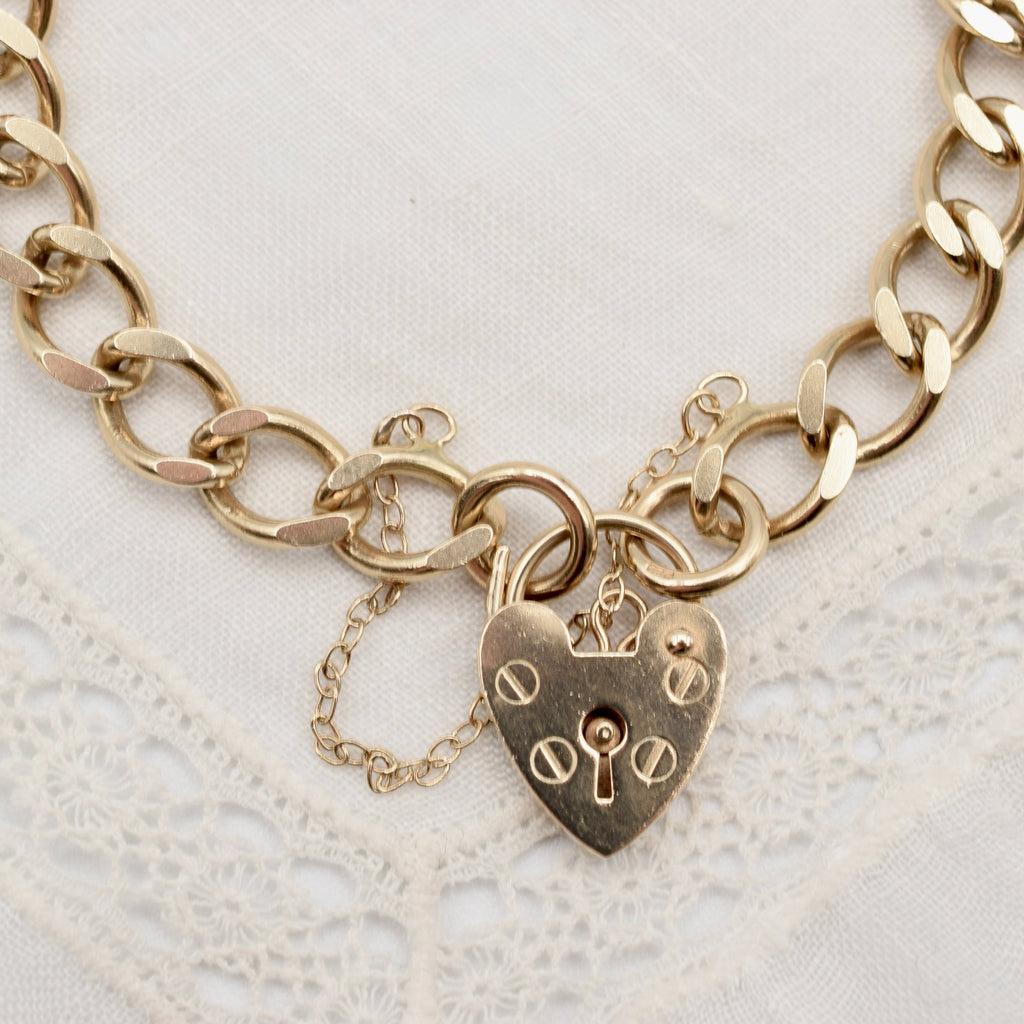 9K Flat Curb Link Charm Bracelet with Heart Padlock Clasp from 1990