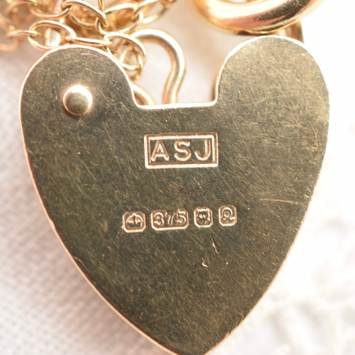 9K Flat Curb Link Charm Bracelet with Heart Padlock Clasp from 1990