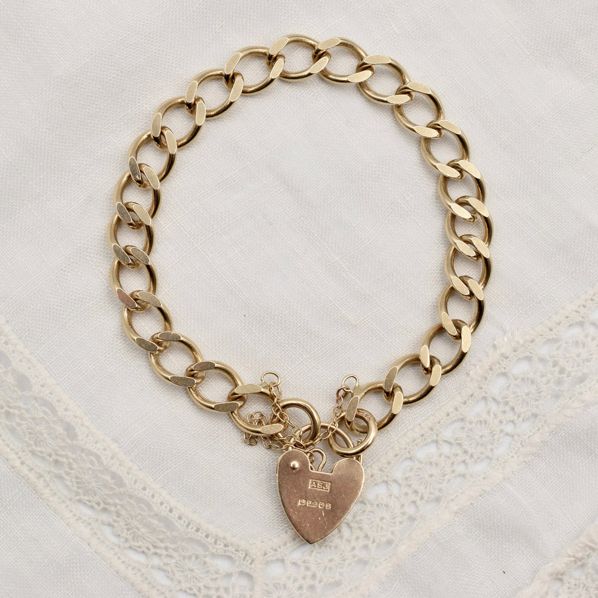 9K Flat Curb Link Charm Bracelet with Heart Padlock Clasp from 1990