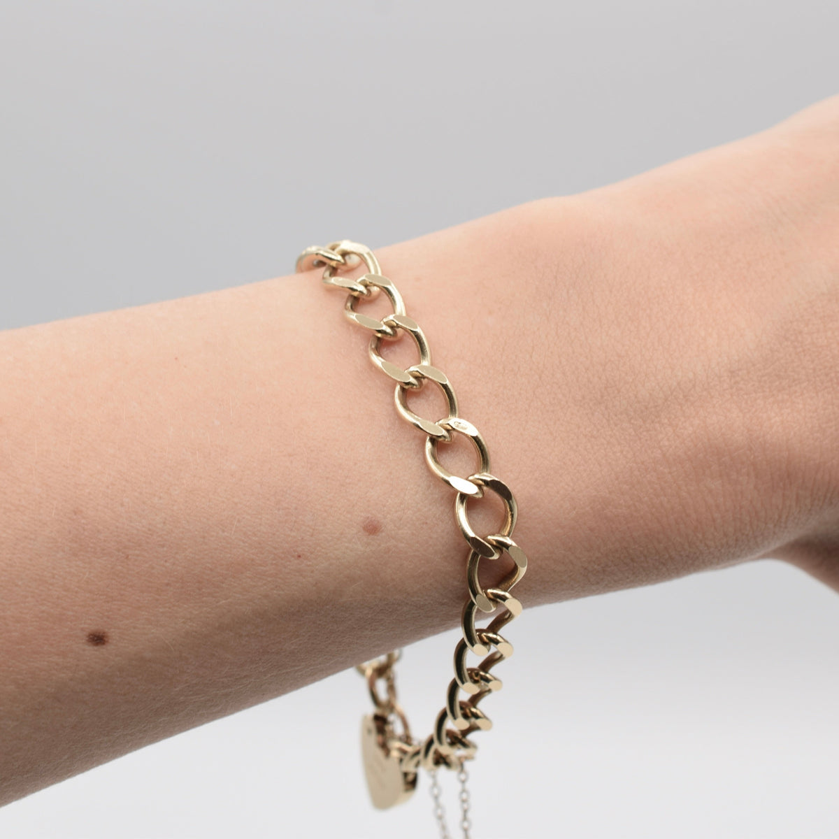 9K Flat Curb Link Charm Bracelet with Heart Padlock Clasp from 1990